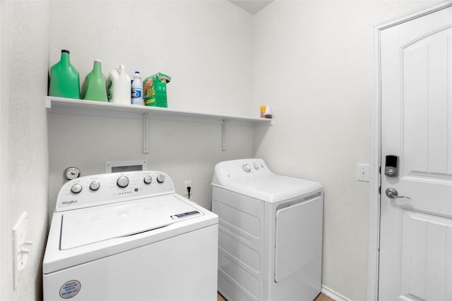 laundry room featuring laundry area and washing machine and dryer