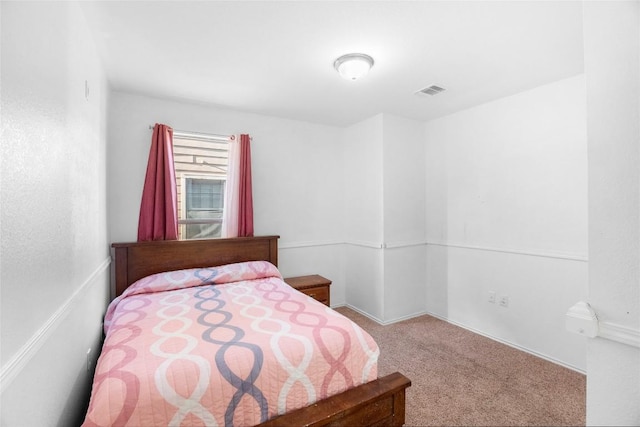 bedroom with carpet flooring and visible vents