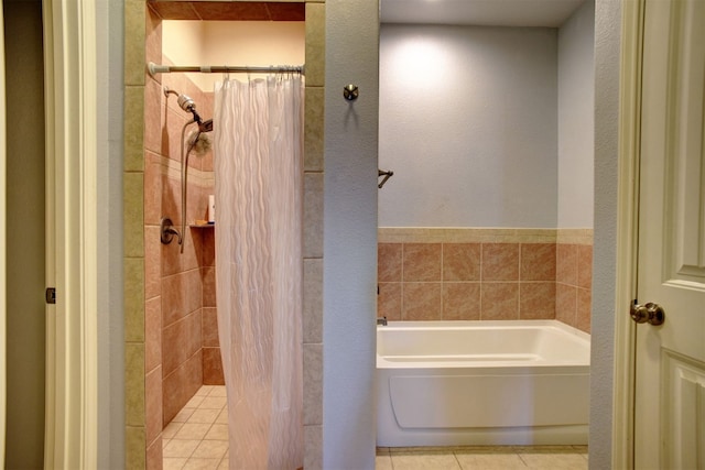 bathroom featuring tile patterned flooring and plus walk in shower