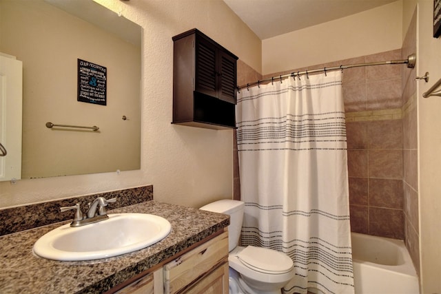 full bathroom with shower / bath combo, vanity, and toilet