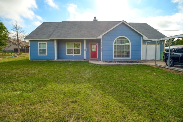 single story home with a front yard and a garage