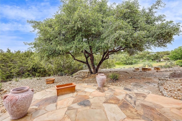 20909 Magellan Cv, Lago Vista, TX 78645 - view of patio / terrace with a fire pit