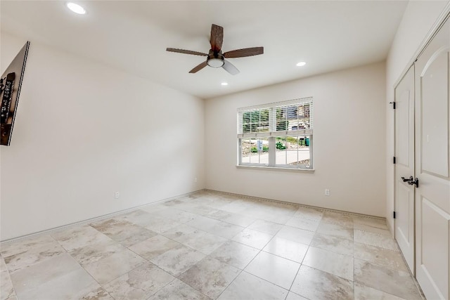 20909 Magellan Cv, Lago Vista, TX 78645 - unfurnished bedroom featuring recessed lighting, a ceiling fan, and a closet