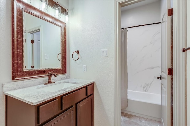20909 Magellan Cv, Lago Vista, TX 78645 - full bath with vanity, shower / bathtub combination with curtain, and a textured wall