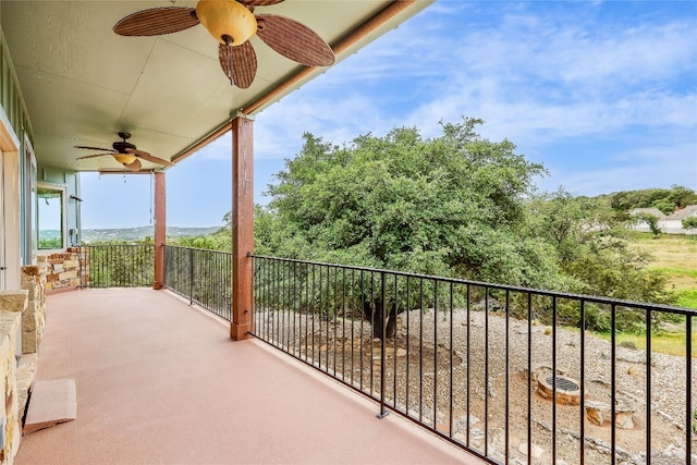 balcony featuring ceiling fan