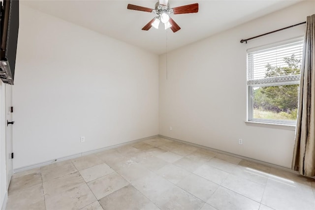 20909 Magellan Cv, Lago Vista, TX 78645 - unfurnished room with ceiling fan and light tile patterned floors