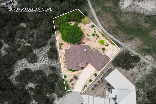 20909 Magellan Cv, Lago Vista, TX 78645 - aerial view of property and surrounding area with property boundaries highlighted