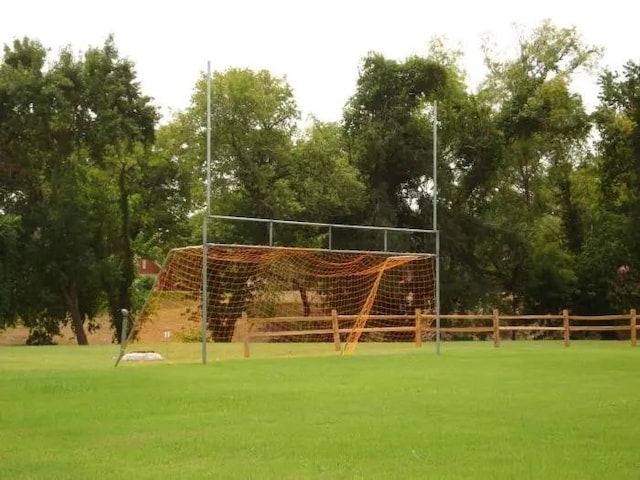 view of home's community with a lawn