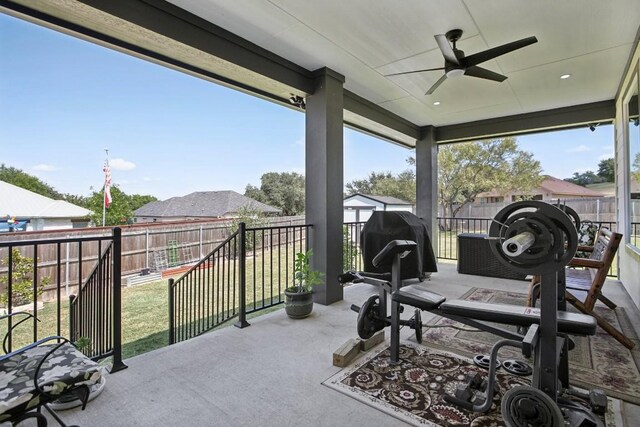 view of patio featuring ceiling fan