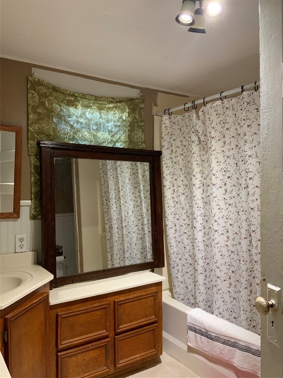 bathroom with vanity and shower / bathtub combination with curtain