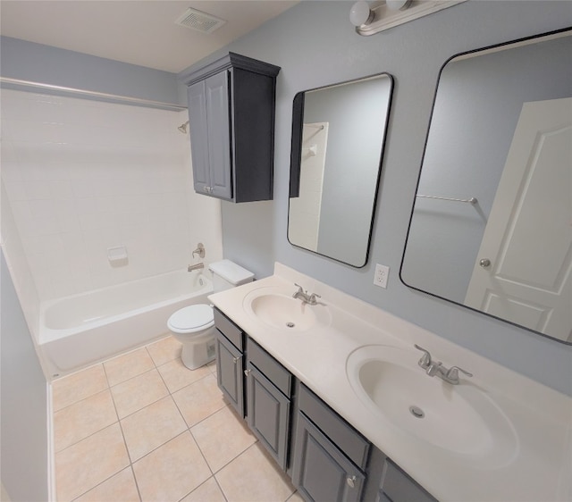 full bathroom featuring tub / shower combination, tile patterned flooring, vanity, and toilet