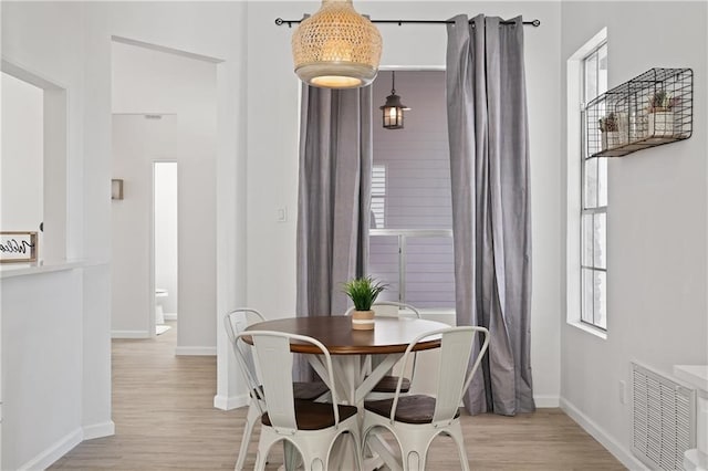 dining room featuring light hardwood / wood-style flooring