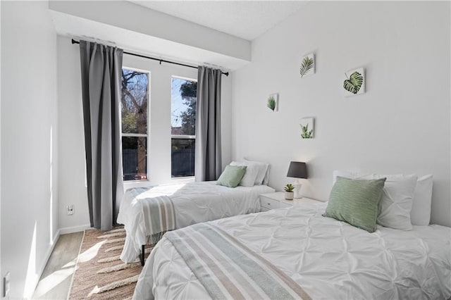 bedroom featuring hardwood / wood-style flooring