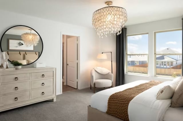 bedroom featuring a notable chandelier and light carpet