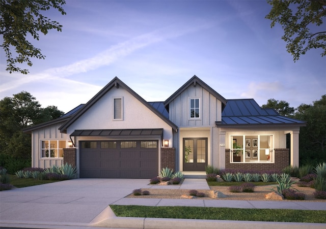 modern farmhouse with french doors, brick siding, concrete driveway, board and batten siding, and a standing seam roof