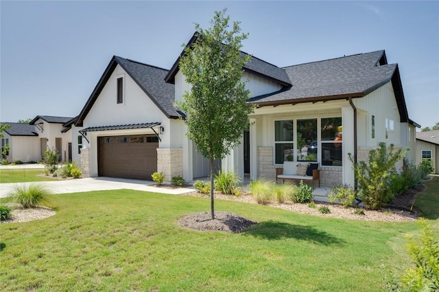 modern farmhouse featuring driveway, a garage, stone siding, roof with shingles, and a front lawn