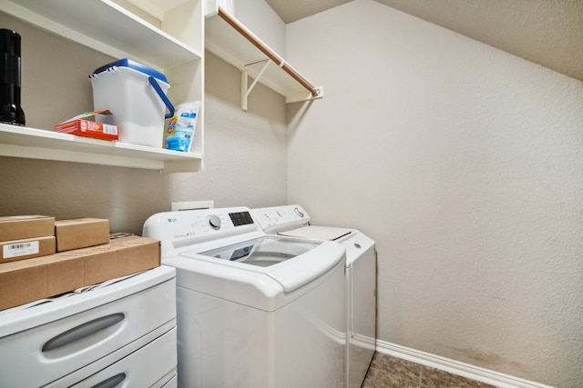 laundry room with washer and dryer