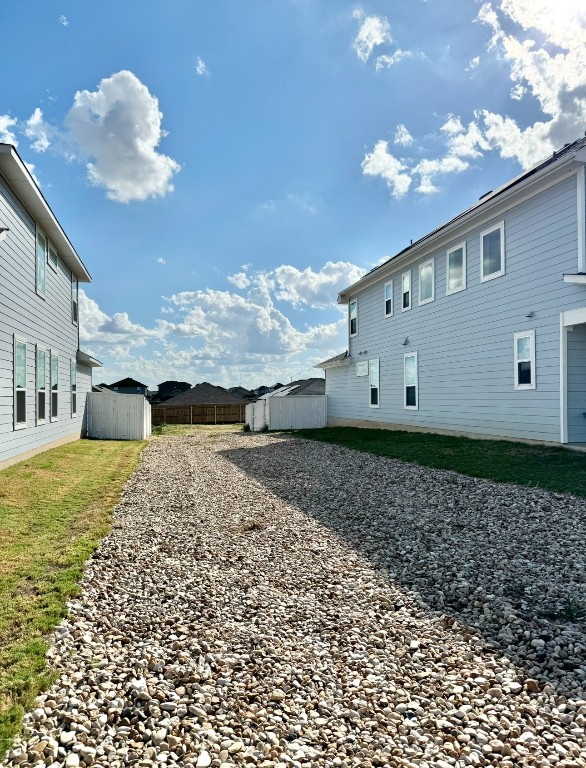 view of yard with a storage shed