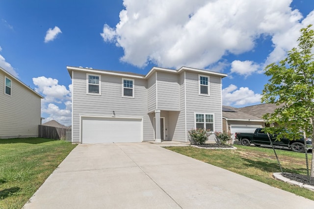 front facade featuring a front yard and a garage