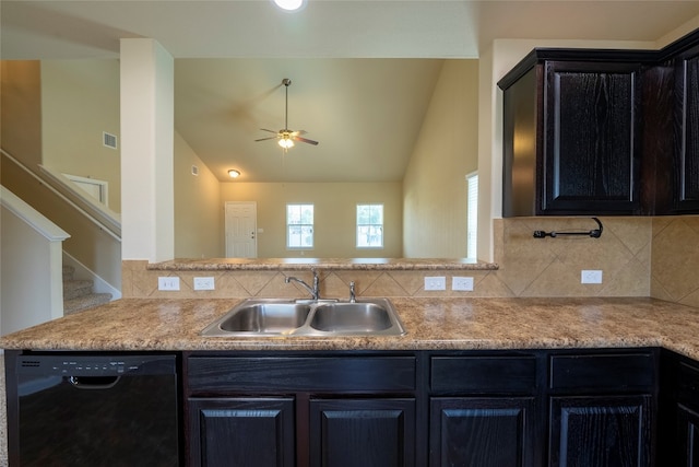 kitchen with vaulted ceiling, black dishwasher, sink, tasteful backsplash, and ceiling fan