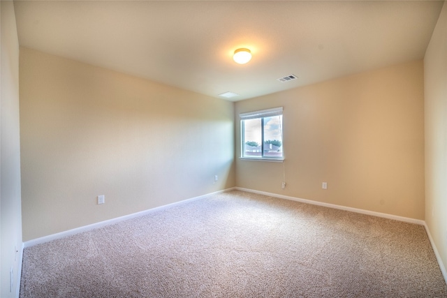 unfurnished room with carpet