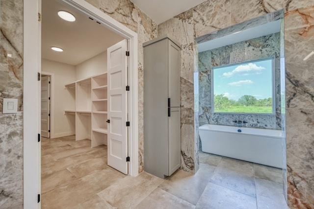 bathroom featuring a bathtub