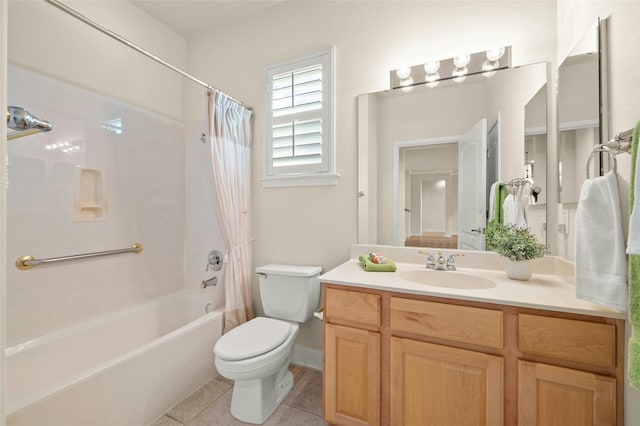 full bathroom featuring tile patterned floors, vanity, toilet, and shower / bath combo with shower curtain