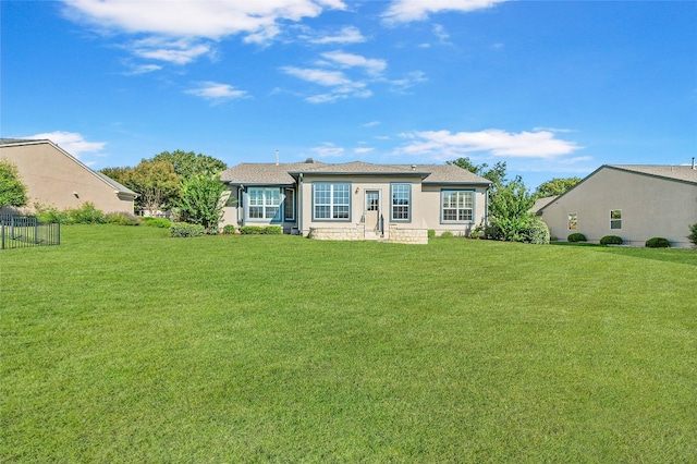 view of front of home with a front lawn