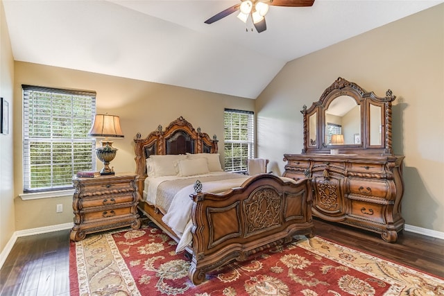 bedroom with hardwood / wood-style flooring, ceiling fan, and vaulted ceiling