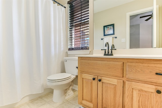 bathroom with ceiling fan, vanity, curtained shower, tile patterned floors, and toilet