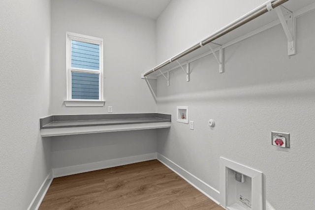 6512 Cowman Way, Austin, TX 78747 - washroom with wood finished floors, hookup for a washing machine, and gas dryer hookup