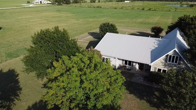 birds eye view of property with a rural view