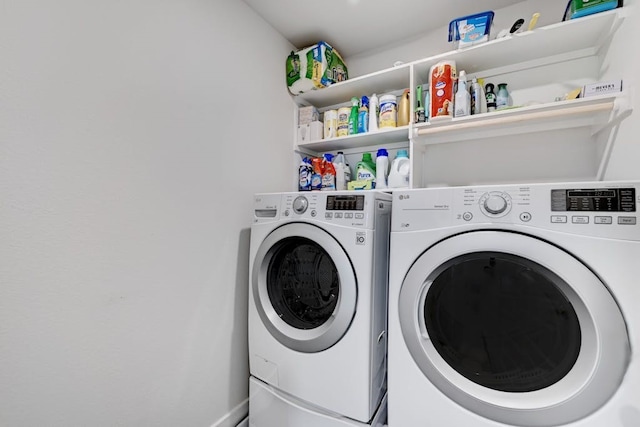 laundry room with independent washer and dryer