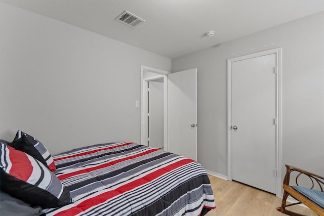 bedroom featuring light hardwood / wood-style floors