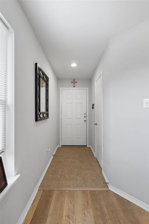 hall featuring light wood-type flooring