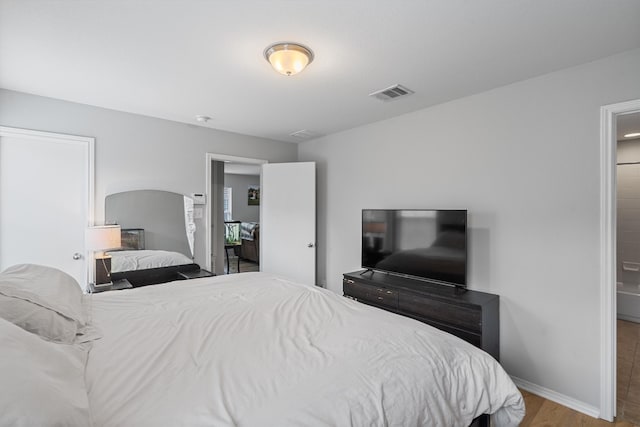 bedroom featuring light hardwood / wood-style floors