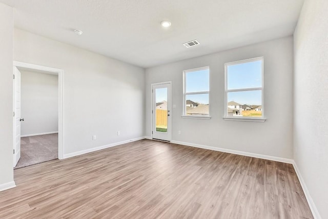 239 Spirit St, Elgin, TX 78621 - spare room featuring wood finished floors and baseboards