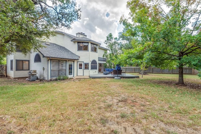 view of yard featuring a wooden deck