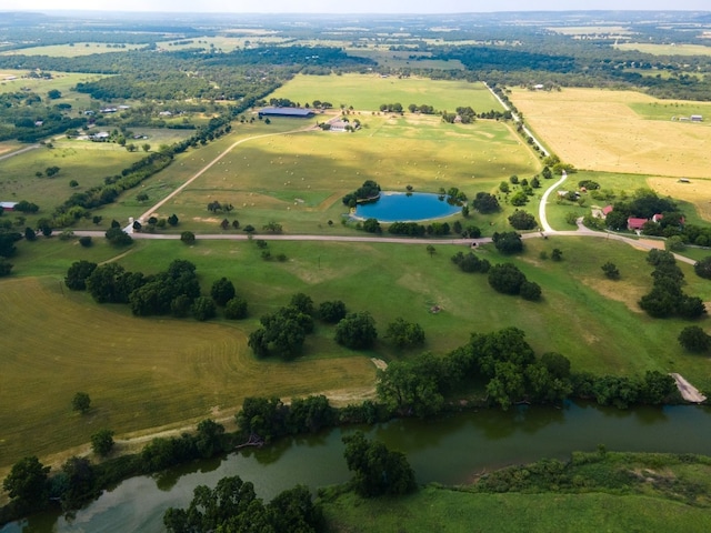 bird's eye view featuring a water view and a rural view