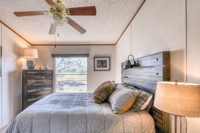 bedroom featuring ornamental molding, a textured ceiling, and ceiling fan