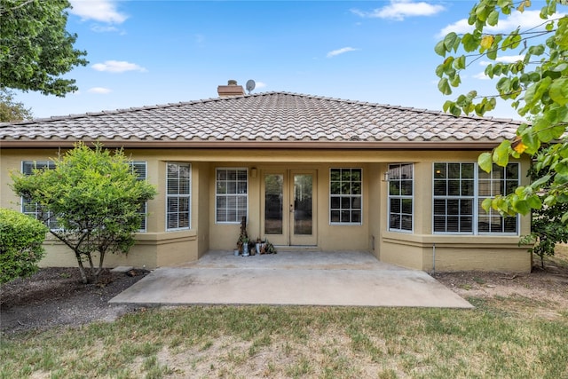 back of property with a patio area