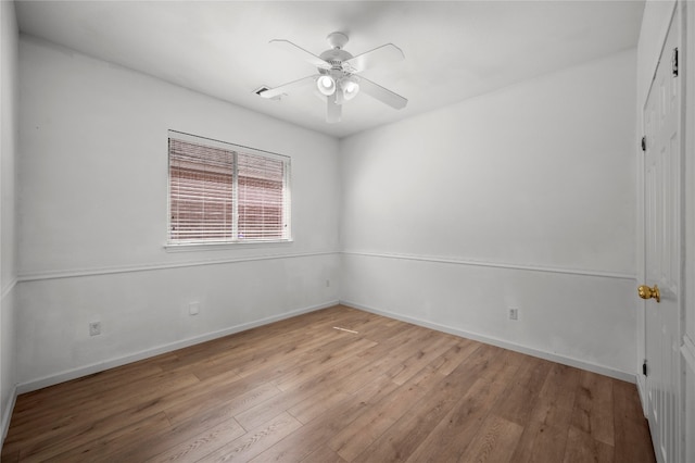 empty room featuring light hardwood / wood-style floors and ceiling fan