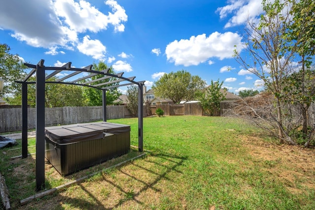 view of yard featuring a pergola, a fenced backyard, and a hot tub