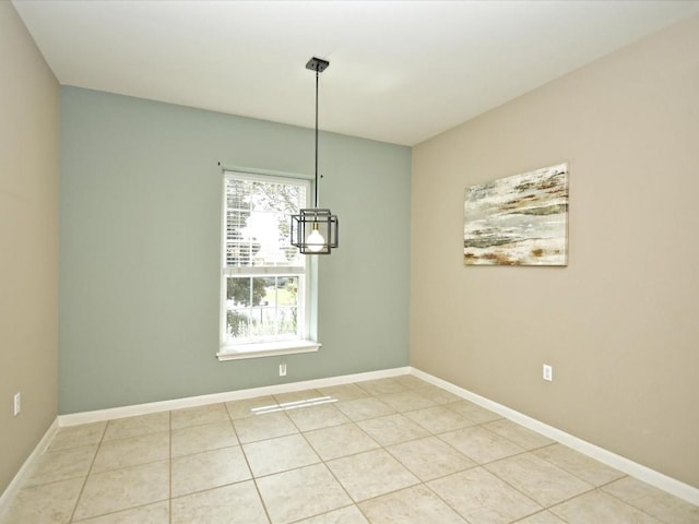 unfurnished dining area featuring light tile patterned floors