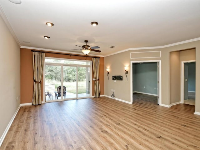 spare room with crown molding, ceiling fan, and light wood-type flooring