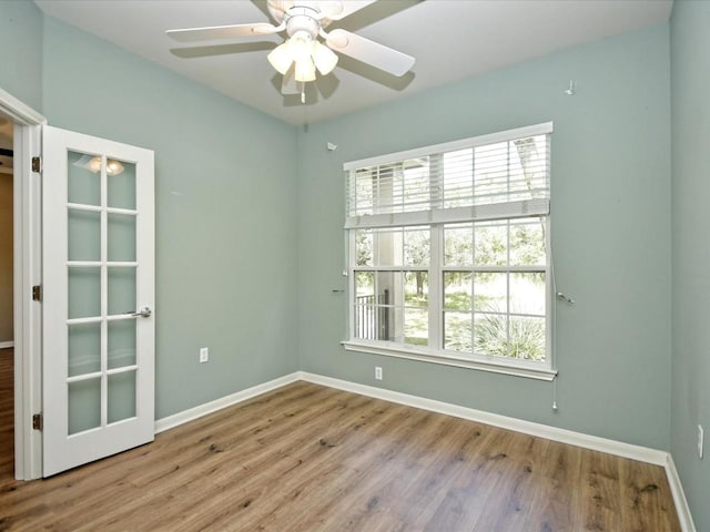 empty room featuring light hardwood / wood-style floors and ceiling fan