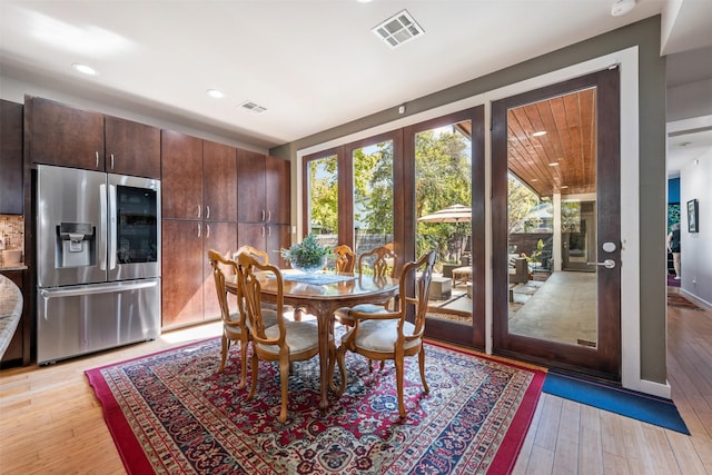 dining area with light wood-type flooring