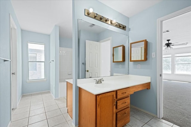 full bath featuring visible vents, vanity, a wealth of natural light, and tile patterned floors