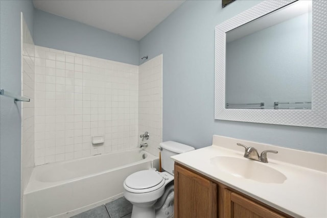 full bath with toilet, shower / tub combination, vanity, and tile patterned floors