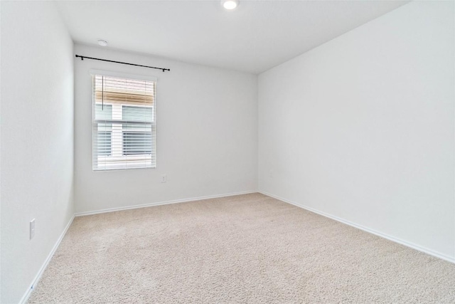 unfurnished room featuring carpet floors